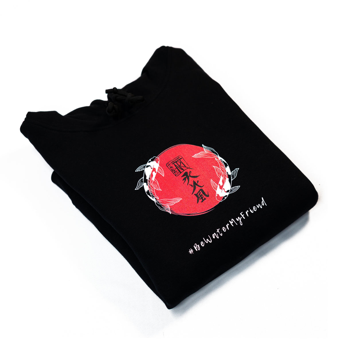 Schwarzes Hanzo Aufguss Art Hoodie mit Kängurutasche und einzigartigem Logo im japanischen Stil, Detailansicht zusammengefaltetes Hoodie